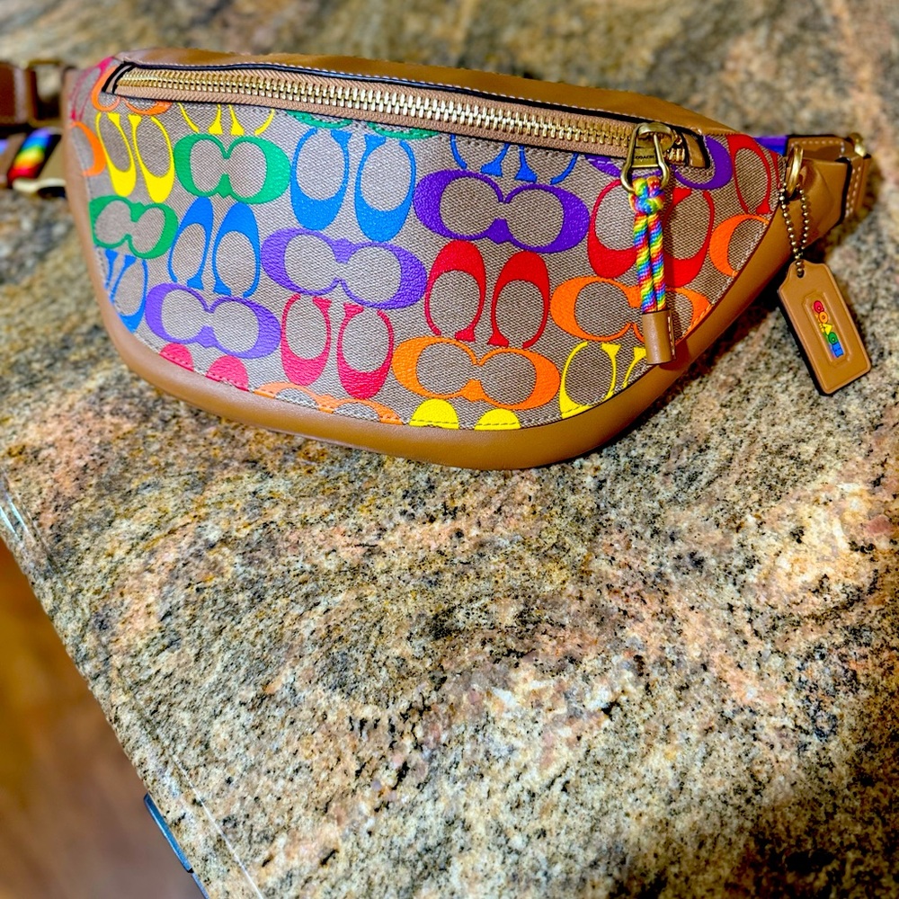 COACH leather and rainbow signature canvas belt bag.
